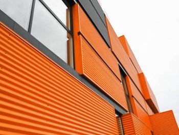 Orange metal building facade, bottom view. High quality photo